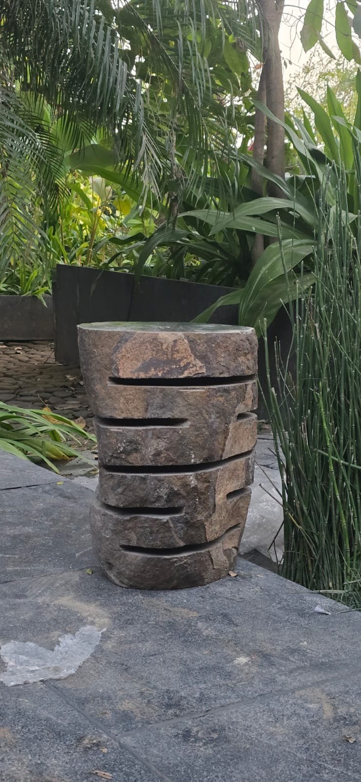 Carved stone stacked stool or planter